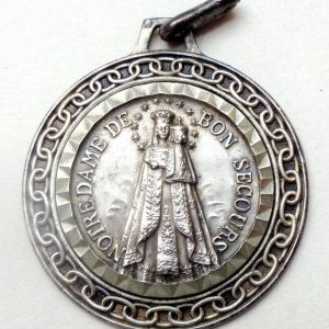 gallery photograph of vintage religious medal to Our Lady of Good Help