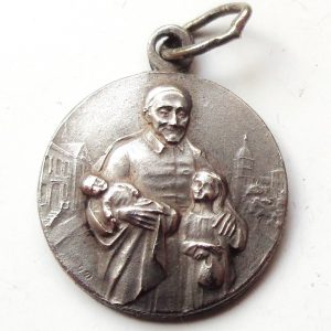 Vintage religious charm medal pendant to Saint Vincent de Paul