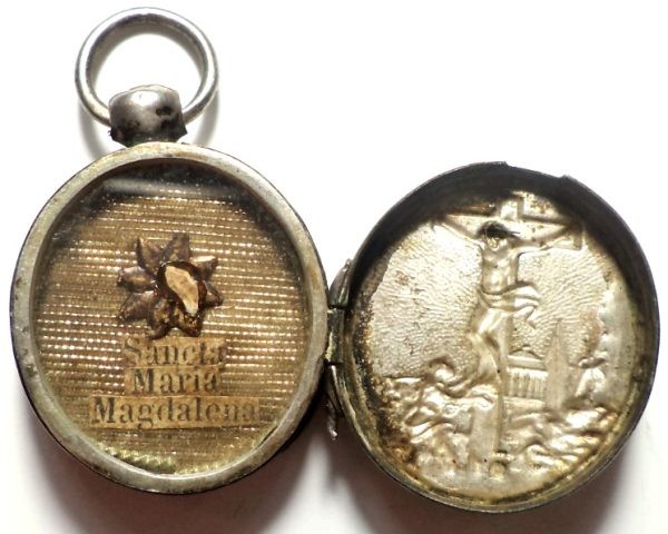 Antique silver locket reliquary containing a relic of Saint Mary Magdalene.