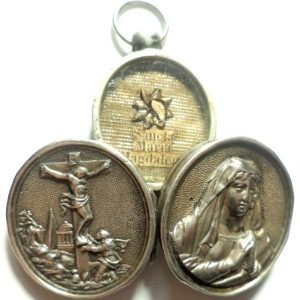 Antique silver locket reliquary containing a relic of Saint Mary Magdalene.