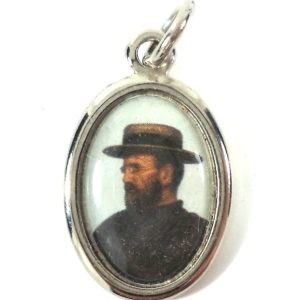 Portrait of Saint Damian of Molokai on a silver-toned vintage medal pendant.