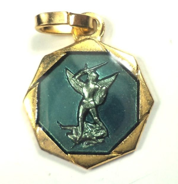 Saint Michael slaying the devil on vintage gilded and blue enamel medal