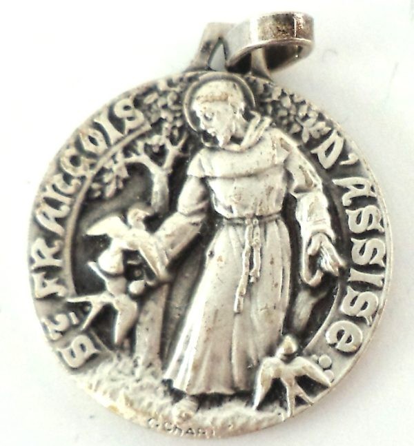 Saint Francis of Assisi silver-plated medal with birds, front view.