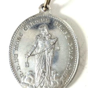 Antique French Carmelite medal front, depicting Our Lady of Mount Carmel with the Christ Child.