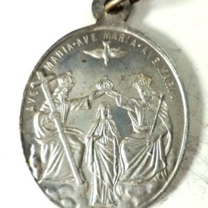 Antique aluminium medal depicting the Immaculate Virgin Mary crowned by the Holy Trinity