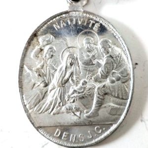 Antique aluminium nativity medal pendant - front side