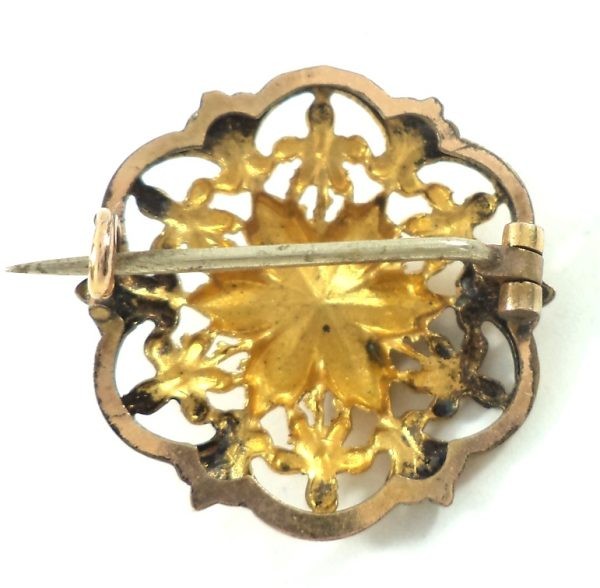 Antique Victorian gold-plated brooch with floral motif and gemstone