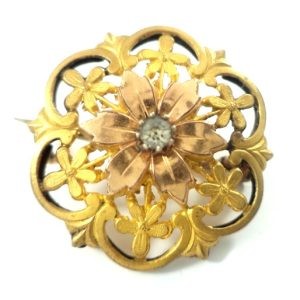 Antique Victorian gold-plated brooch with floral motif and gemstone