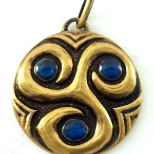 Bronze triskelion pendant with blue poured glass by J. Balme