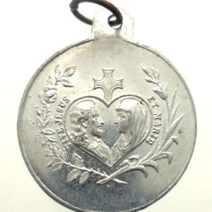 Antique aluminum medal of Saint John Eudes with Sacred and Immaculate Hearts.