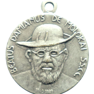 Vintage silverplated Saint Damian of Molokai medal with portrait and symbolic reverse design, 18 mm diameter.